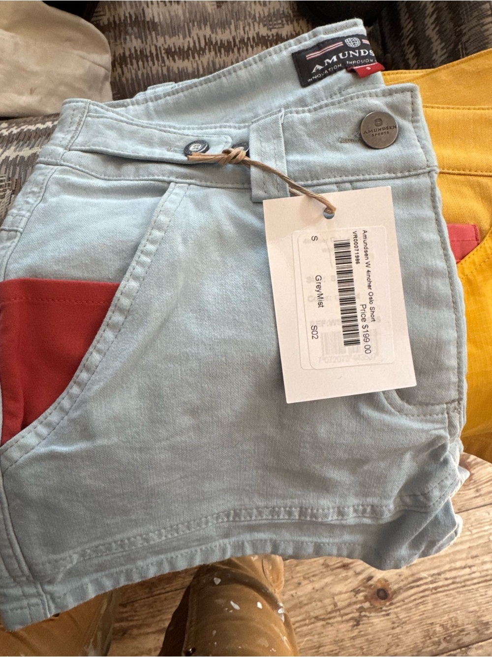 Amundsen Light Blue Women's Jean Shorts with Red Pocket Accent